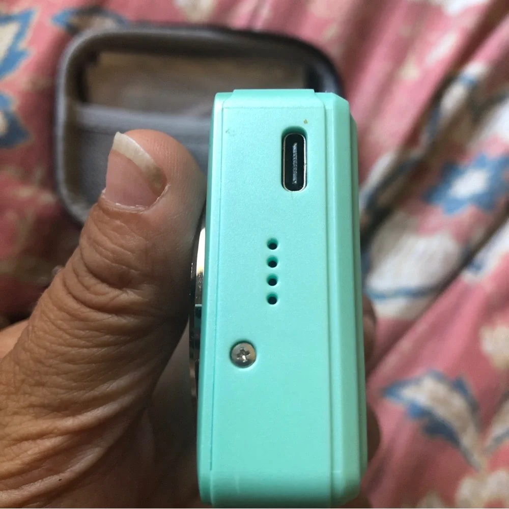 44.0 mega pixels 16x zoom turquoise camera
